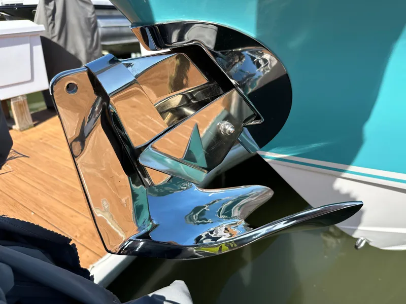 Slide: The Image of Close-up of a 2020 Nor-Tech 390 Sport boat's polished anchor. - 38