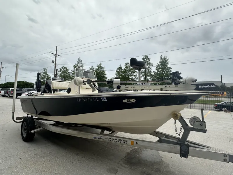 Slide: The Image of 2016 Frontier 180 CC boat on trailer with MotorGuide trolling motor. - 4