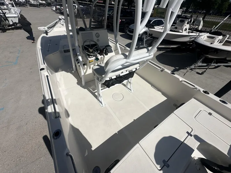 Slide: The Image of 2021 Bulls Bay 2400 boat interior with center console and seating. - 17