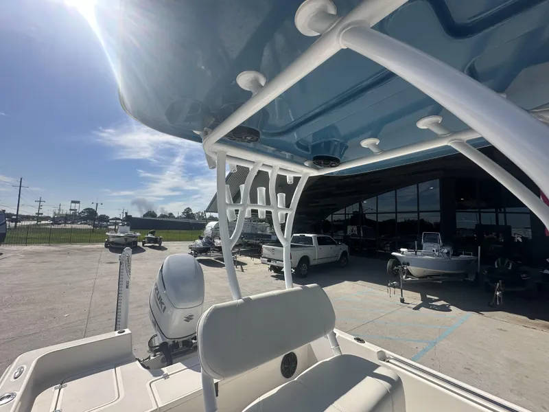 Slide: The Image of 2021 Bulls Bay 2400 boat with Suzuki outboard motor at dealership. - 19