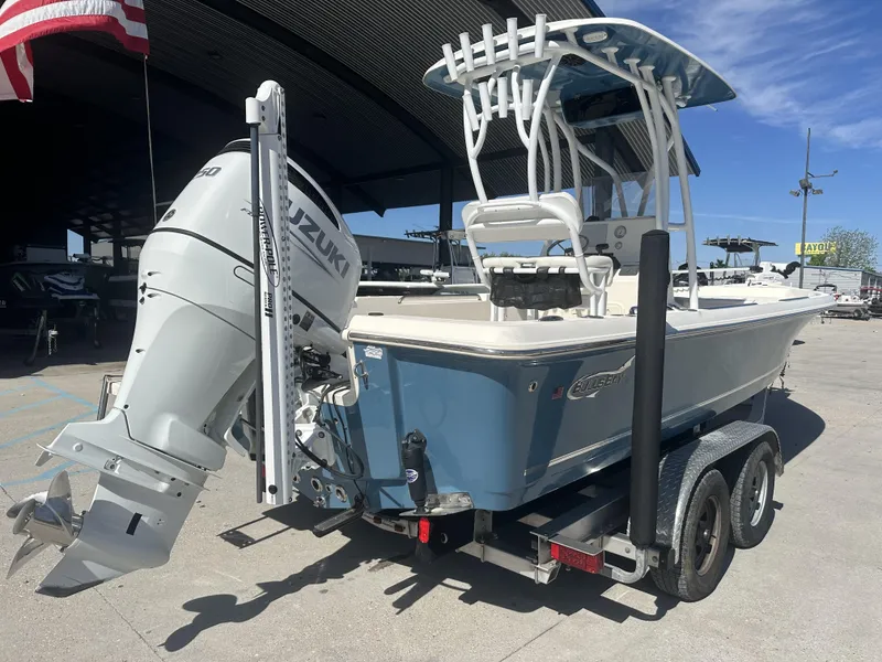 Slide: The Image of 2021 Bulls Bay 2400 boat with Suzuki outboard motor on trailer. - 8