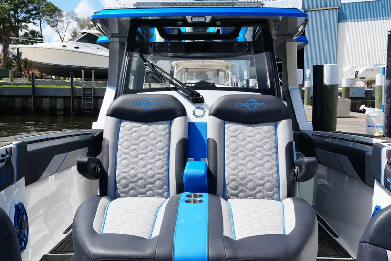 Slide: The Image of 2024 Fountain 38 SCX boat interior with stylish seating and modern design. - 34