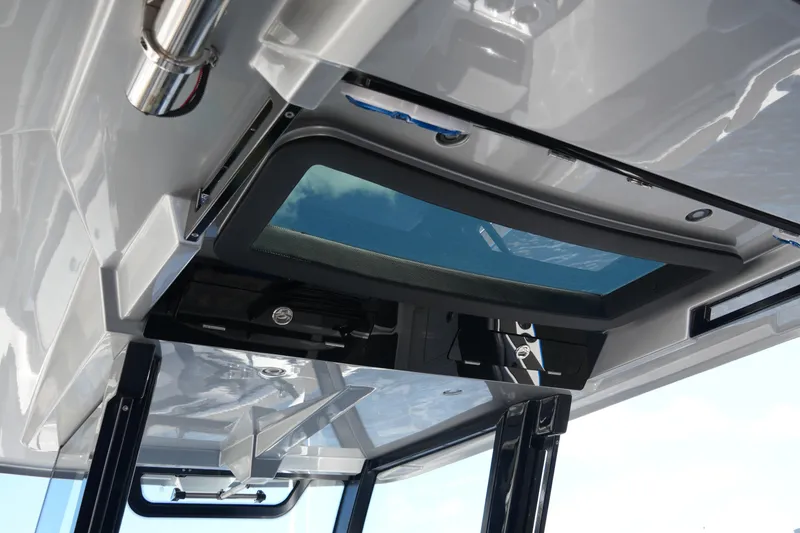 Slide: The Image of 2024 Fountain 38 SCX boat interior roof with skylight and sleek design. - 37