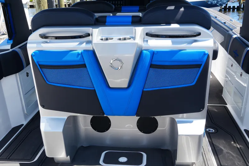 Slide: The Image of 2024 Fountain 38 SCX boat interior with blue and black seating and modern design. - 45
