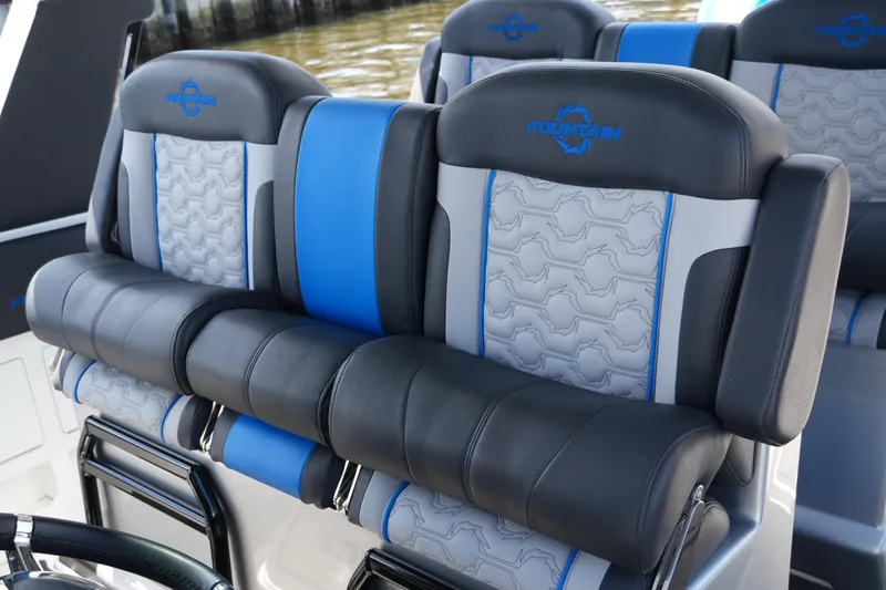 Slide: The Image of 2024 Fountain 38 SCX boat seats with blue and gray upholstery design. - 47