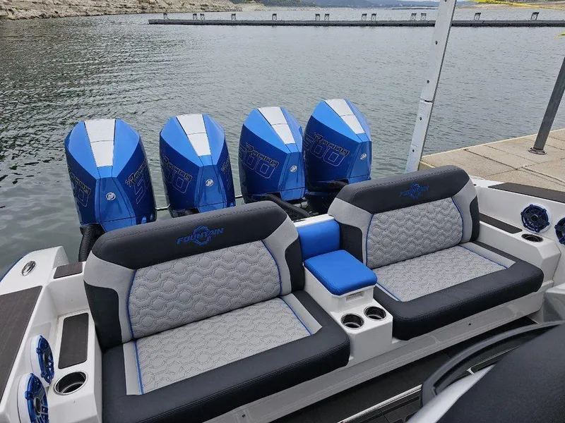 Slide: The Image of 2024 Fountain 38 SCX boat with quad outboard engines and luxurious seating. - 7
