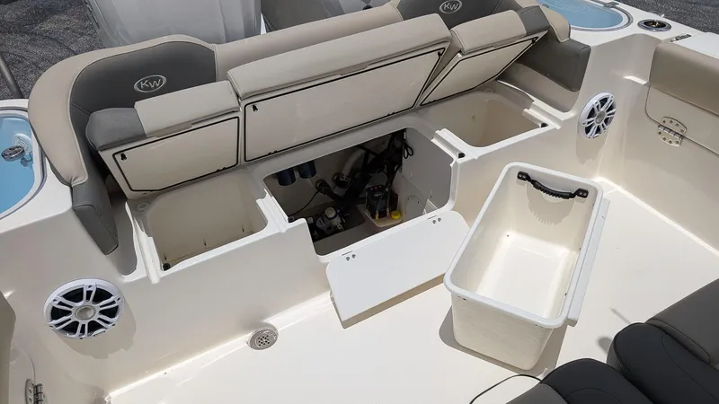 Slide: The Image of 2025 Key West 291 FS boat interior with storage compartments and seating. - 7
