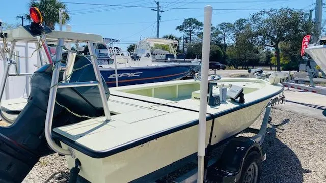 Slide: The Image of 1983 Maverick 18 Flats Boat on a trailer in a boatyard. - 5