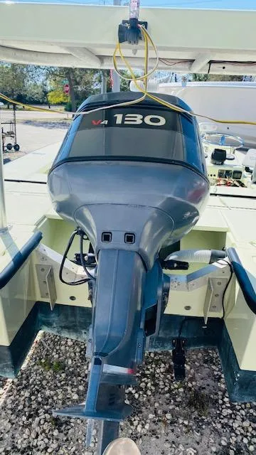 Slide: The Image of 1983 Maverick 18 Flats Boat with V4 130 outboard motor. - 4
