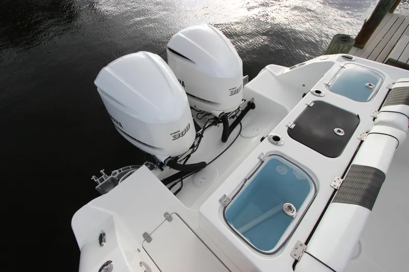 Slide: The Image of 2020 Wellcraft 302 Fisherman boat with twin 300 horsepower engines. - 11