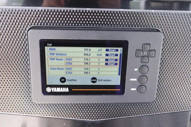 Slide: The Image of Yamaha display on 2020 Wellcraft 302 Fisherman showing trip data and fuel usage. - 27