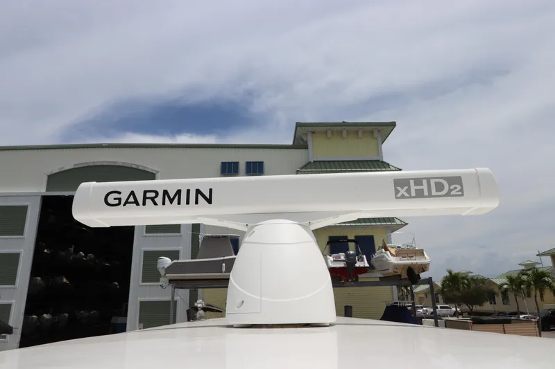 Slide: The Image of Garmin xHD2 radar on 2020 Wellcraft 302 Fisherman boat, marina background. - 29