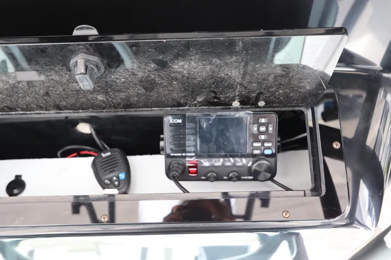 Slide: The Image of ICOM radio system on a 2020 Wellcraft 302 Fisherman boat. - 32