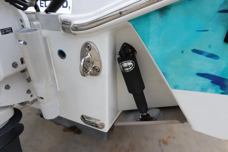Slide: The Image of 2020 Wellcraft 302 Fisherman boat transom with trim tab actuator. - 9