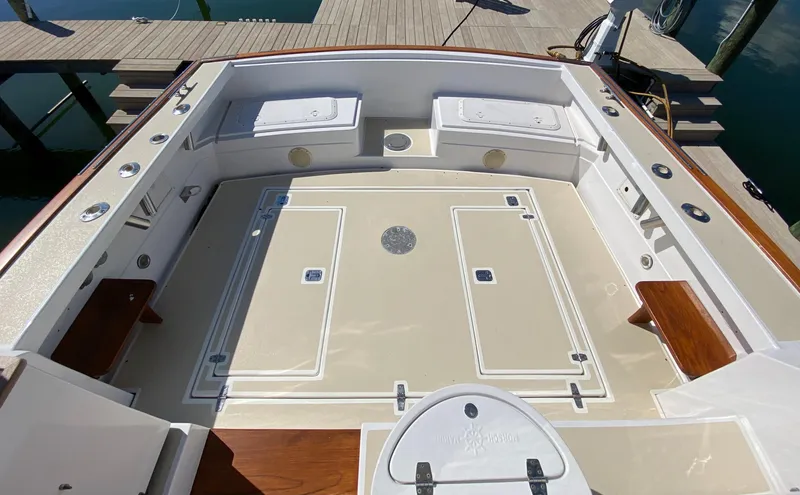 Slide: The Image of Spacious deck of a 2000 Little Harbor 42 Whisper Jet yacht docked at a marina. - 11