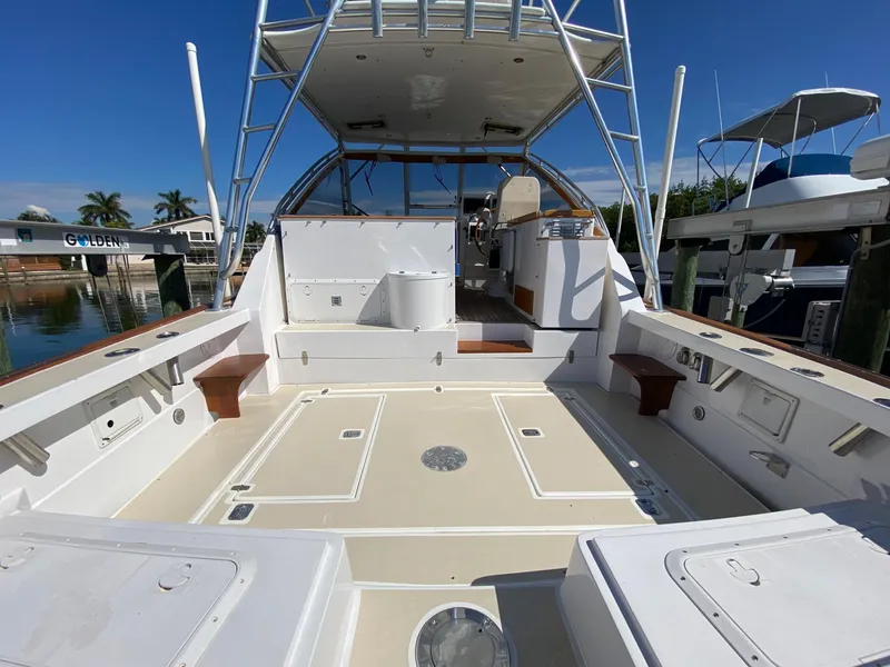 Slide: The Image of Little Harbor 42 Whisper Jet 2000 boat with spacious deck and seating area. - 12