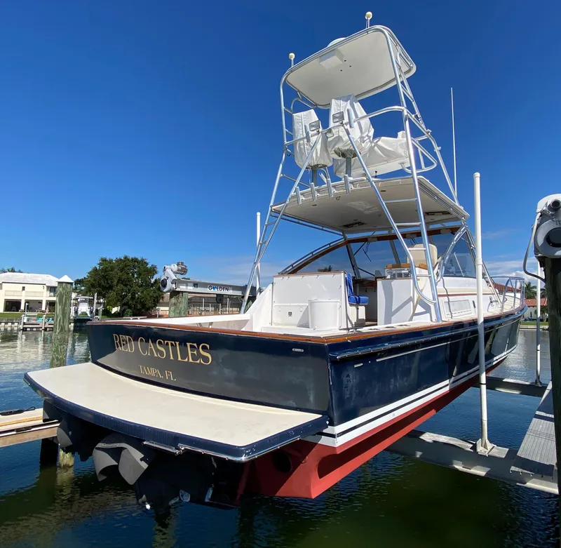 Slide: The Image of Little Harbor 42 Whisper Jet 2000 yacht Red Castles docked in a marina. - 7