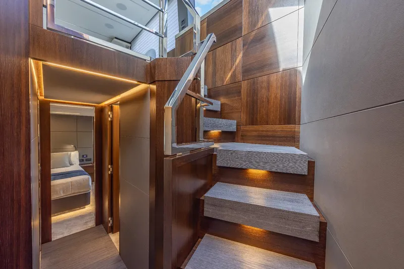 Slide: The Image of Luxurious interior of 2024 Astondoa Flybridge yacht with modern staircase and bedroom. - 41