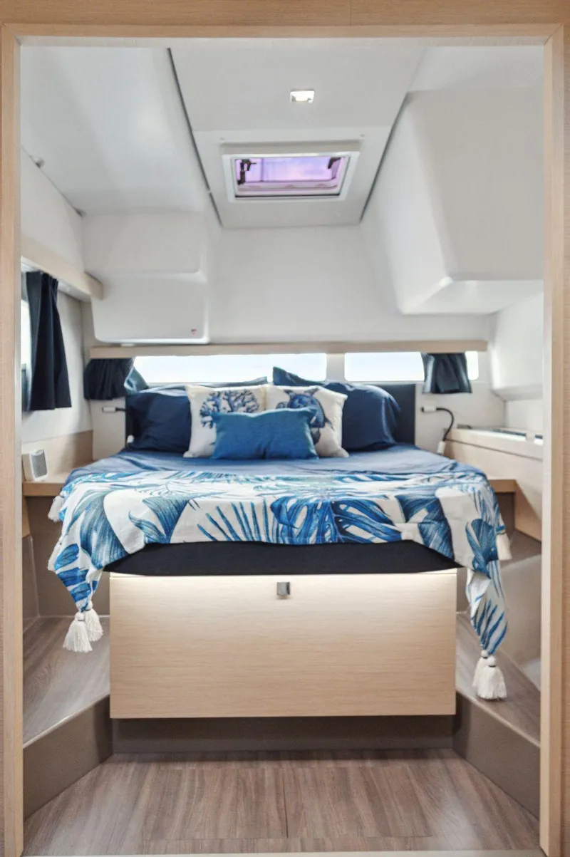 Slide: The Image of Luxurious 2018 Fountaine Pajot Lucia 40 cabin with stylish bedding and modern design. - 12