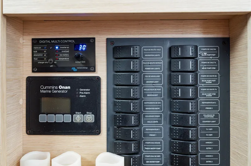 Slide: The Image of Control panel of 2018 Fountaine Pajot Lucia 40 with Cummins Onan marine generator. - 16