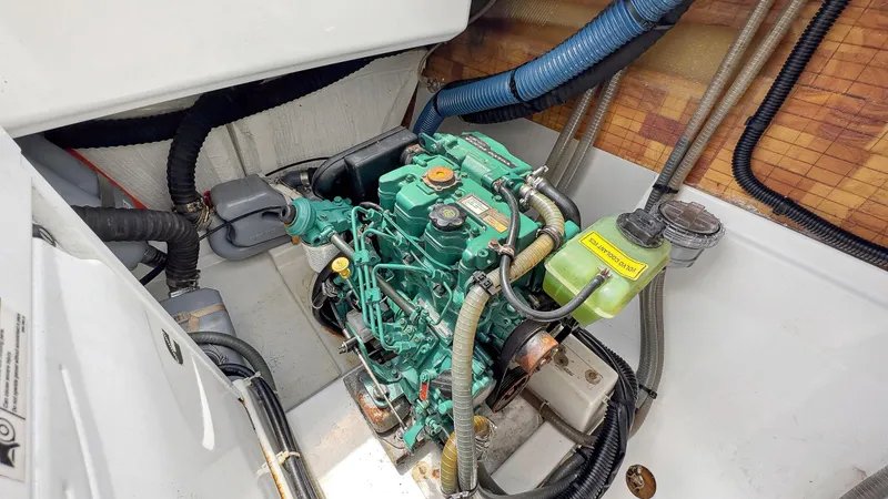 Slide: The Image of Engine compartment of 2018 Fountaine Pajot Lucia 40 catamaran, showcasing mechanical components. - 19