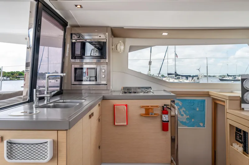Slide: The Image of Modern kitchen interior of 2018 Fountaine Pajot Lucia 40 catamaran with ocean view. - 6