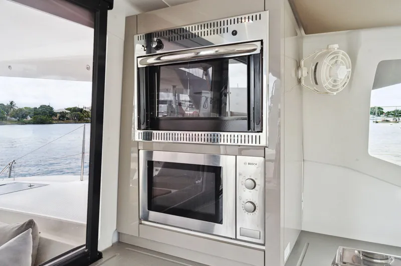 Slide: The Image of Modern kitchen appliances on 2018 Fountaine Pajot Lucia 40 catamaran. - 7