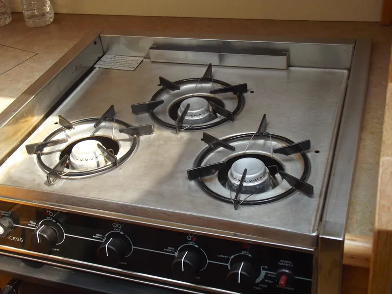 Slide: The Image of Three-burner stove in 2000 Bayliner 3388 Motor Yacht kitchen area. - 19