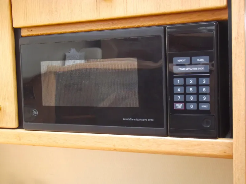 Slide: The Image of Built-in microwave in 2000 Bayliner 3388 Motor Yacht kitchen. - 20