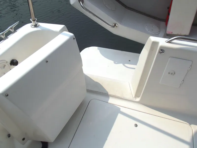 Slide: The Image of Bayliner 3388 Motor Yacht 2000, white deck area with seating and railing. - 3