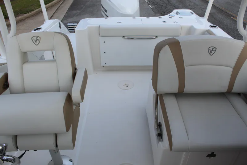 Slide: The Image of Interior of a 2018 Century 24 Resorter boat with beige seating. - 10