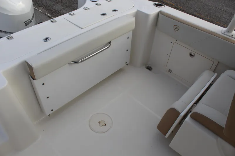 Slide: The Image of Interior of a 2018 Century 24 Resorter boat, white upholstery. - 16