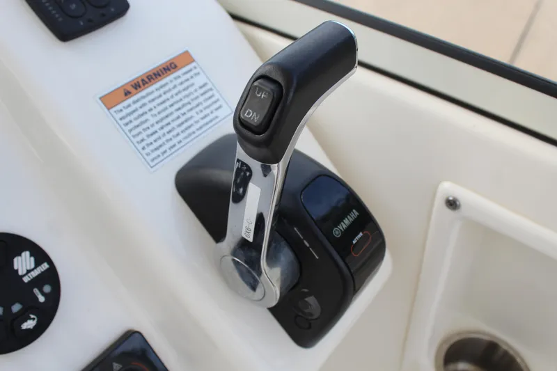Slide: The Image of Yamaha throttle lever on Century 24 Resorter 2018 boat. - 26
