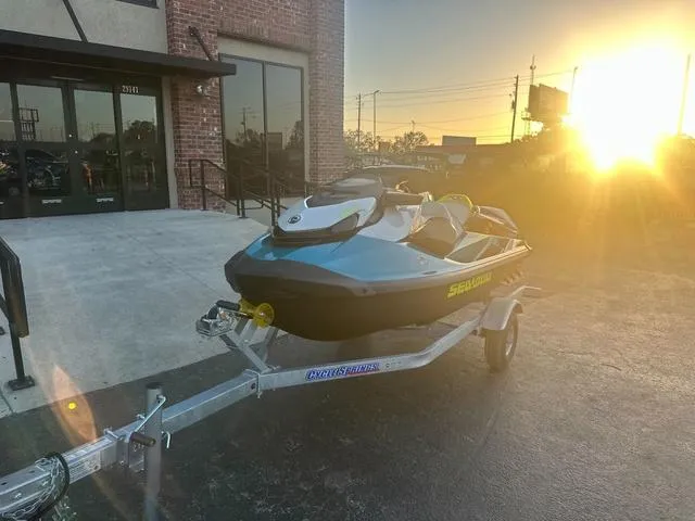 Slide: The Image of 2024 Sea-Doo Waverunner GTI on trailer, parked outdoors. - 4