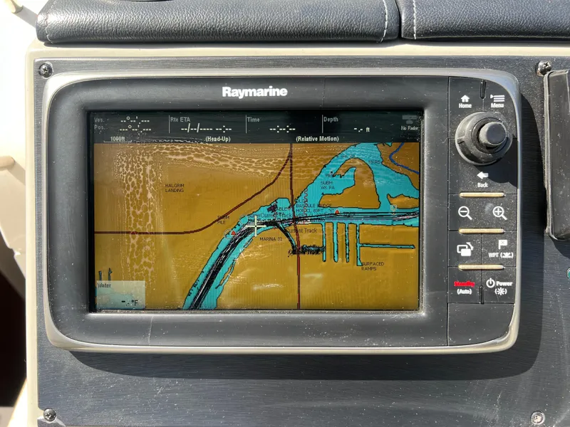 Slide: The Image of Raymarine navigation system on a 2014 Sea Ray 350 Sundancer boat. - 14