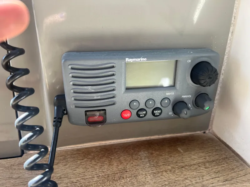 Slide: The Image of Raymarine radio on 2014 Sea Ray 350 Sundancer boat dashboard. - 15