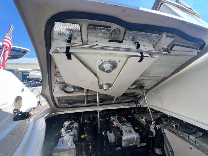 Slide: The Image of Engine compartment of a 2014 Sea Ray 350 Sundancer boat. - 22