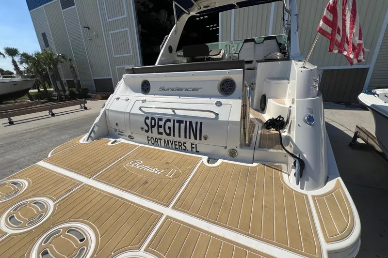 Slide: The Image of 2014 Sea Ray 350 Sundancer yacht docked, displaying Spegitini and Fort Myers, FL on the stern. - 5