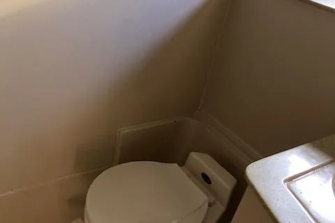 Slide: The Image of Boat bathroom with compact toilet, 2000 Cruisers 3870 model. - 10