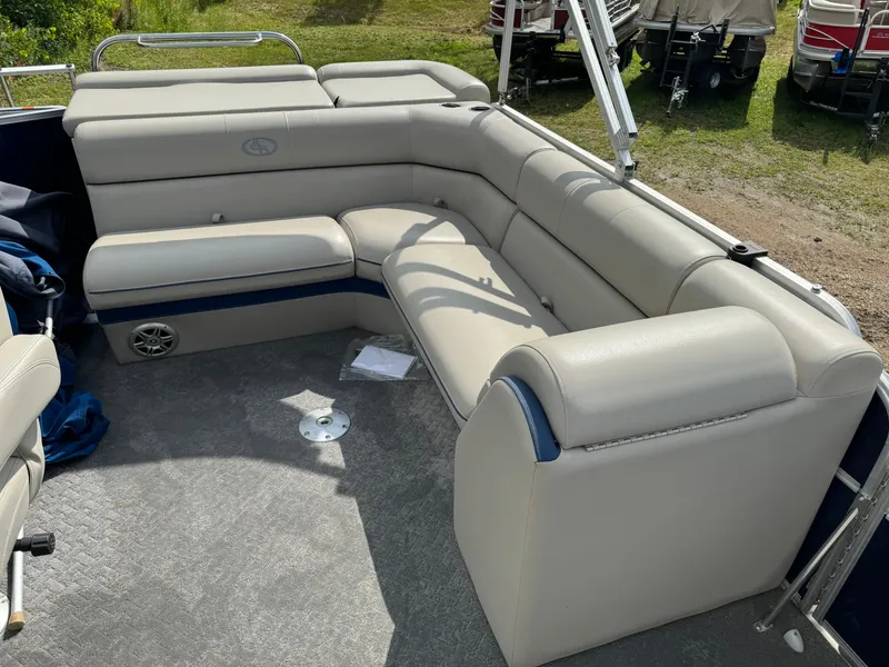 Slide: The Image of 2014 South Bay 520FC pontoon boat with beige seating and spacious deck. - 12