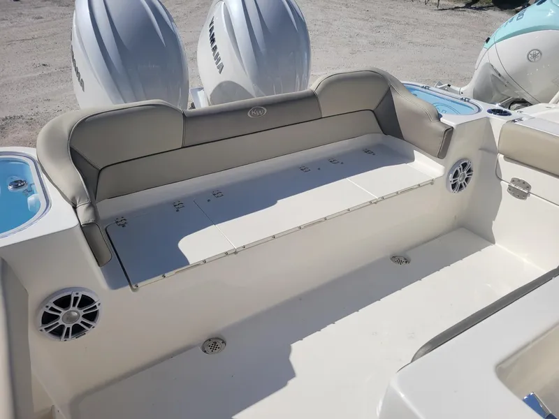 Slide: The Image of 2024 Key West 263 FS boat interior detail with rod holder and cup holder. - 11