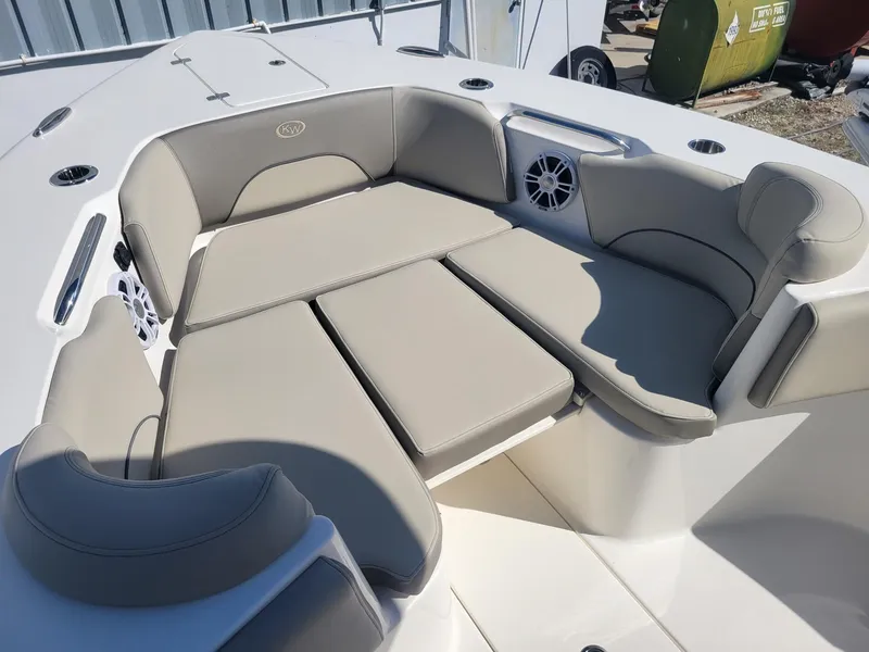 Slide: The Image of 2024 Key West 263 FS boat interior with compact marine toilet. - 15