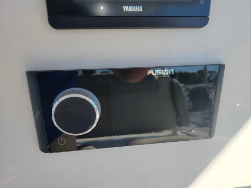 Slide: The Image of 2024 Key West 263 FS boat ladder on cracked pavement background. - 7