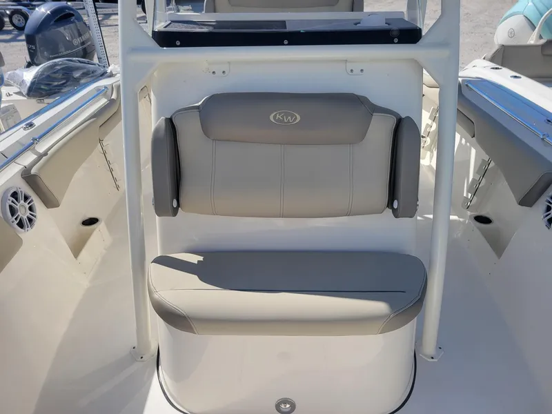 Slide: The Image of 2024 Key West 263 FS boat interior with seating and storage area. - 9