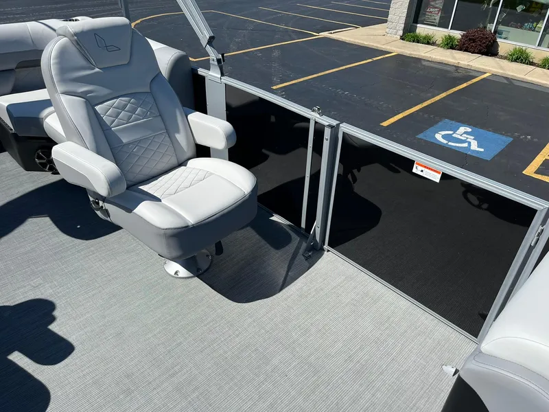 Slide: The Image of 2024 Lowe SS 210 WT boat with comfortable seating and modern design. - 13