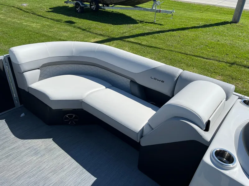 Slide: The Image of 2024 Lowe SS 210 WT pontoon boat with luxurious seating. - 20