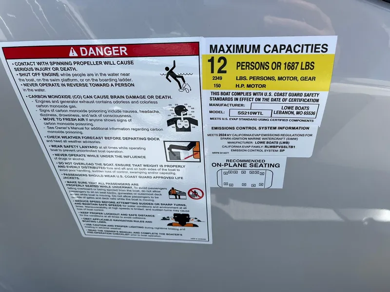 Slide: The Image of 2024 Lowe SS 210 WT boat capacity and safety warning labels. - 27