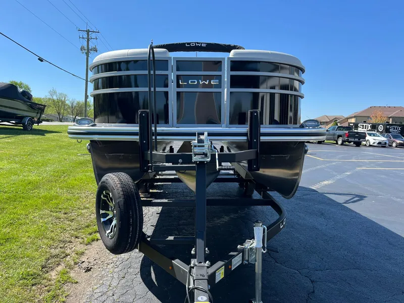 Slide: The Image of 2024 Lowe SS 210 WT pontoon boat on trailer, front view. - 4