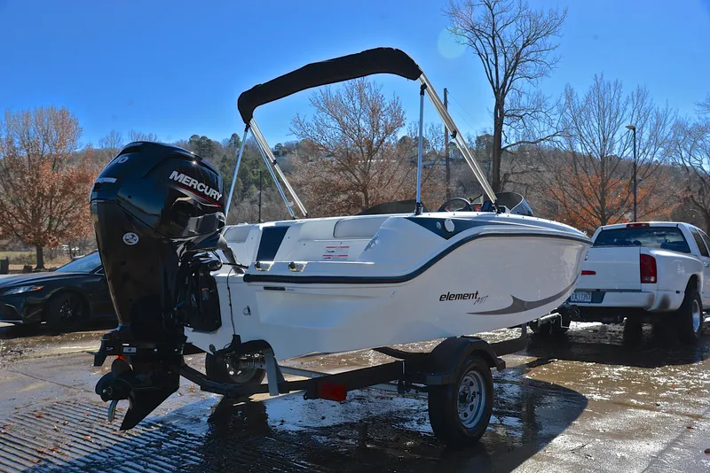 Slide: The Image of 2023 Bayliner Element M17 boat on trailer with Mercury outboard motor. - 14