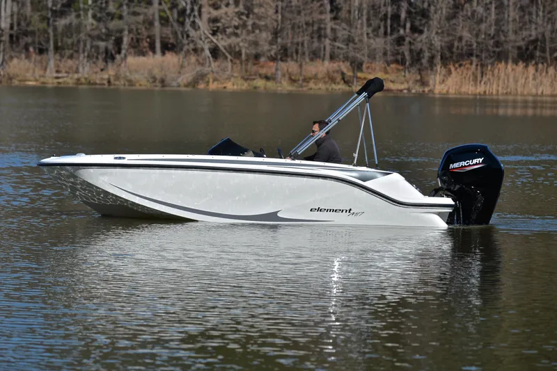 Slide: The Image of 2023 Bayliner Element M17 boat on a calm lake. - 9